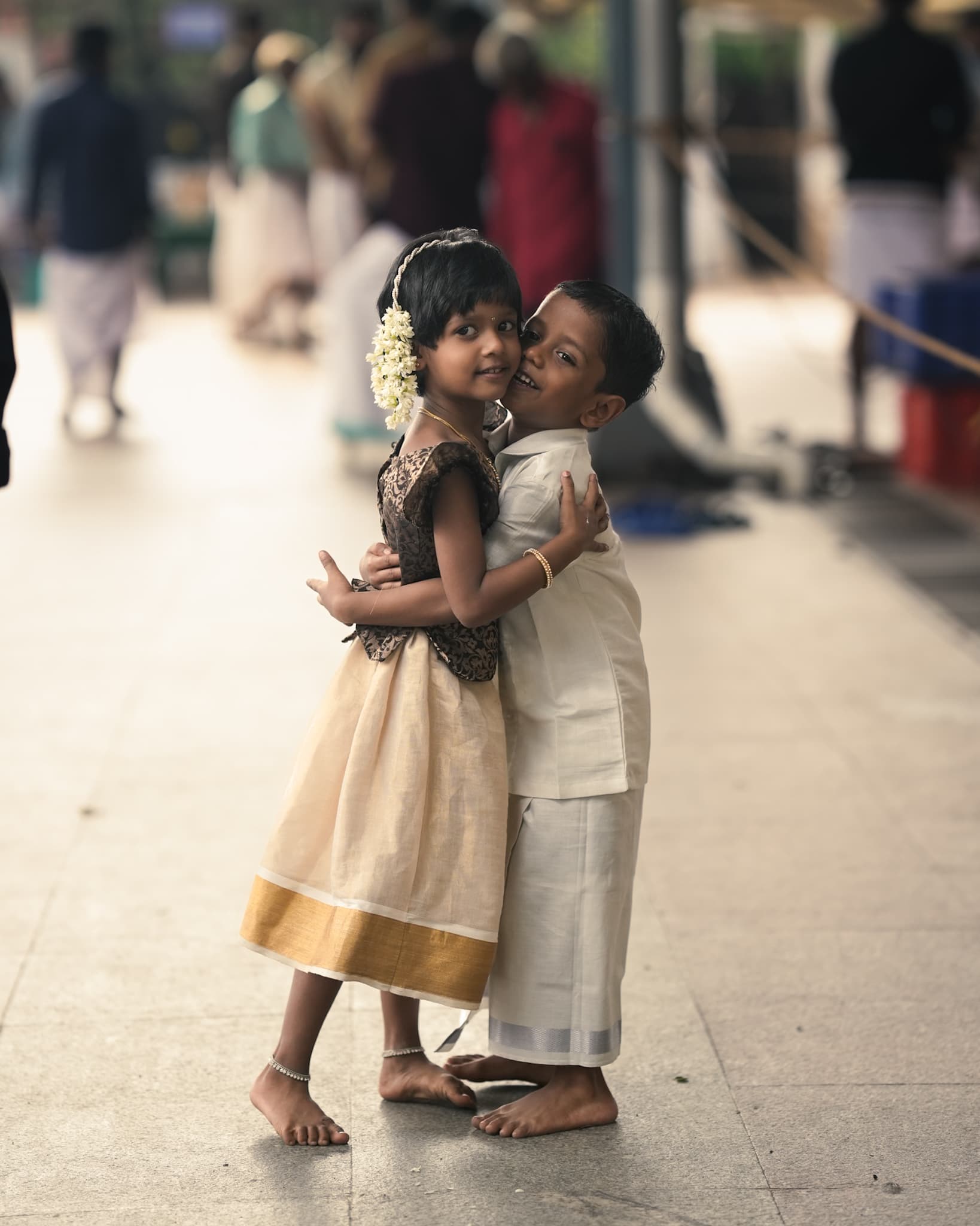 boy and a girl child hugging